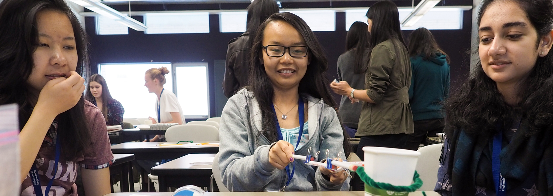 students playing with equipment in a classroom