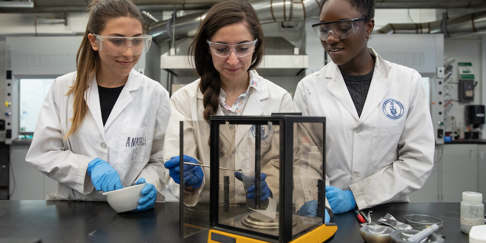 (From left to right)  Anastasia Alksnis, MASc Candidate, Alexandra Tavasoli, PhD Candidate, and Ayesha David, MASc Candidate work in the MSE Lab at the Wallberg Memorial Building at the University of Toronto in Toronto, Ontario on May 9, 2018.
Photo by Laura Pedersen/Engineering Strategic Communications